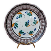 Old plate with brown border and flowers called black bottom