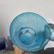 Conical vase in turquoise blue bubbled glass