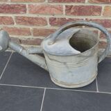 Zinc watering can with its apple