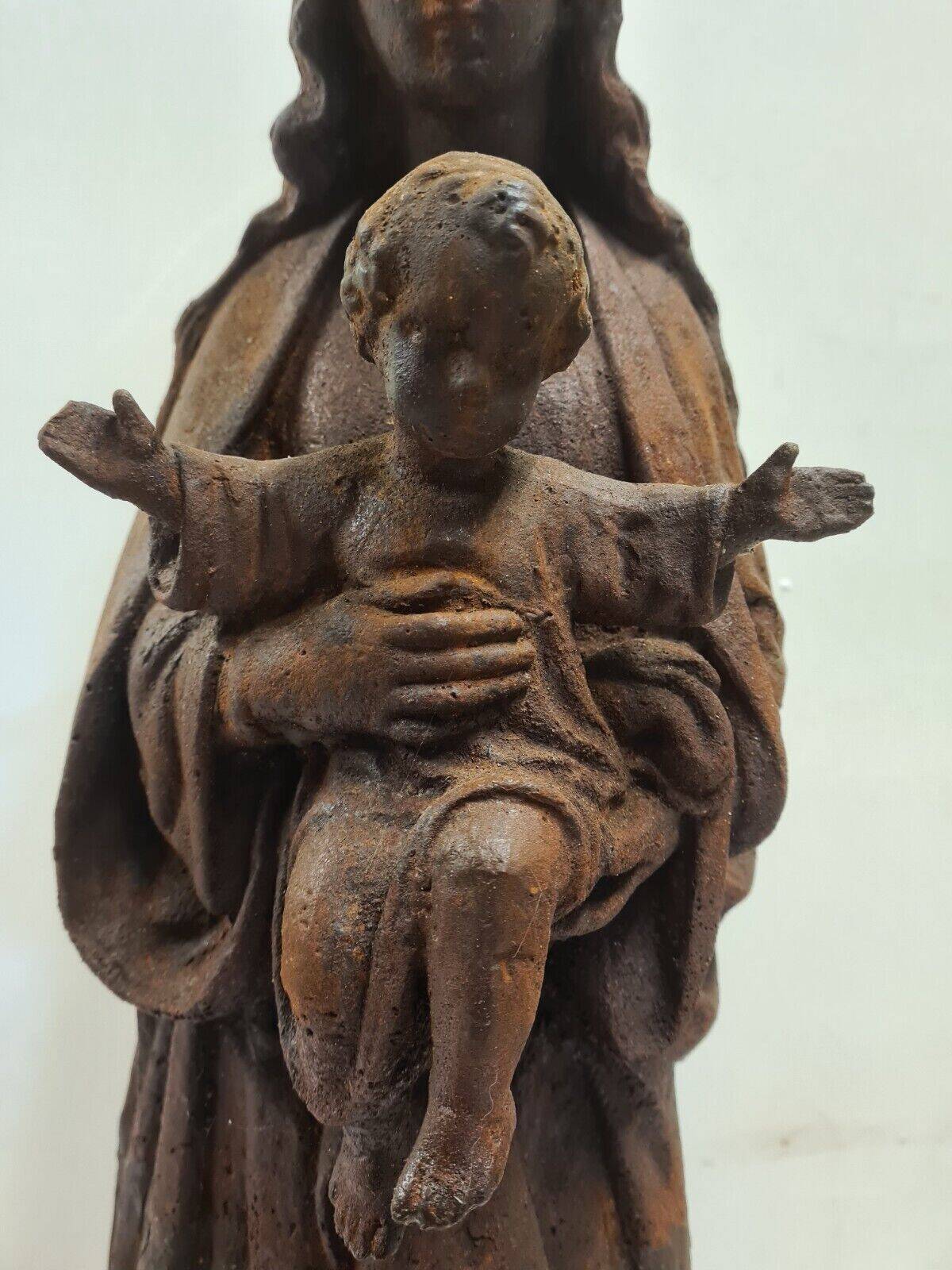 statue of the holy virgin in cast iron