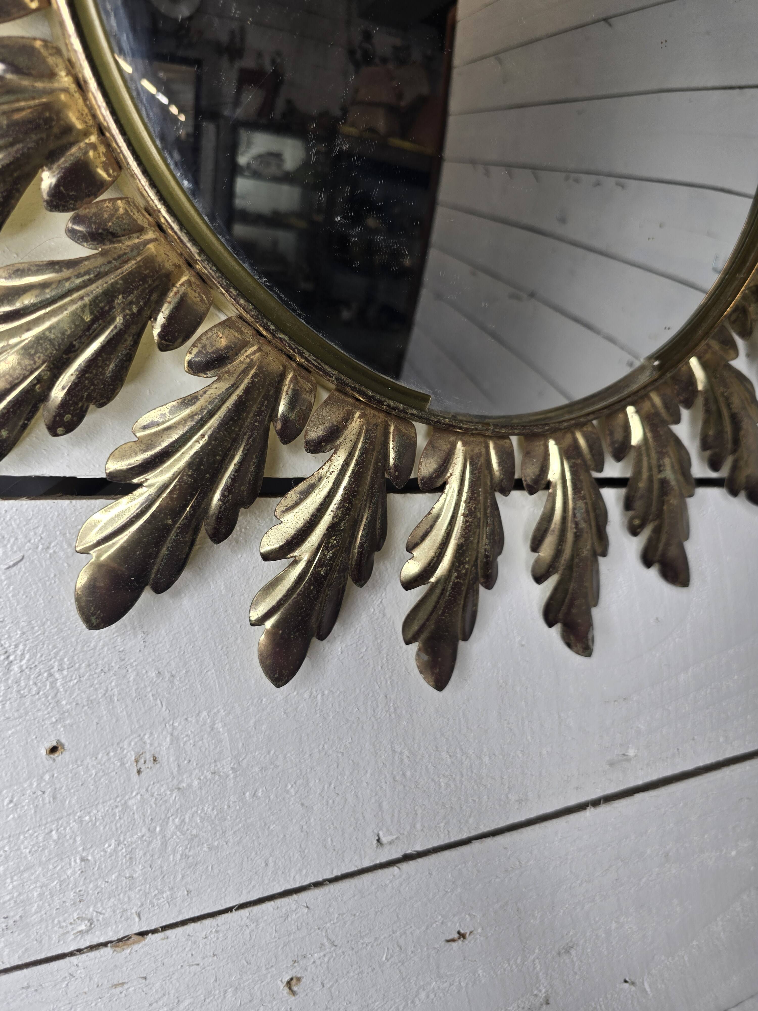 Witch's eye sun mirror in gold metal from the 60s