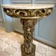 Carved wooden and marble console