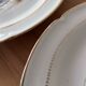 4 flat antique plates in Limoges porcelain