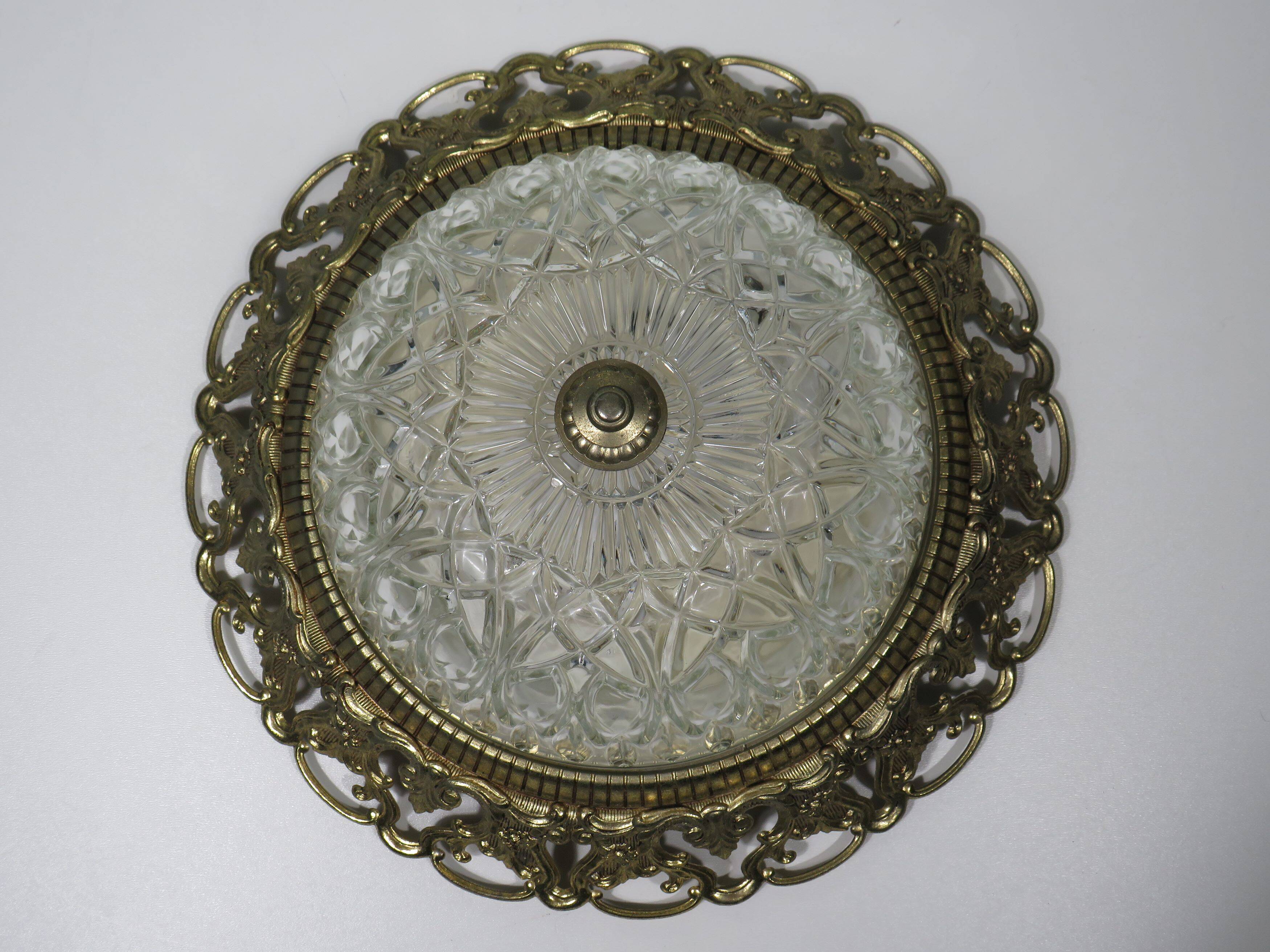 Hollywood Regency ceiling light, cut glass and openwork gold edge.