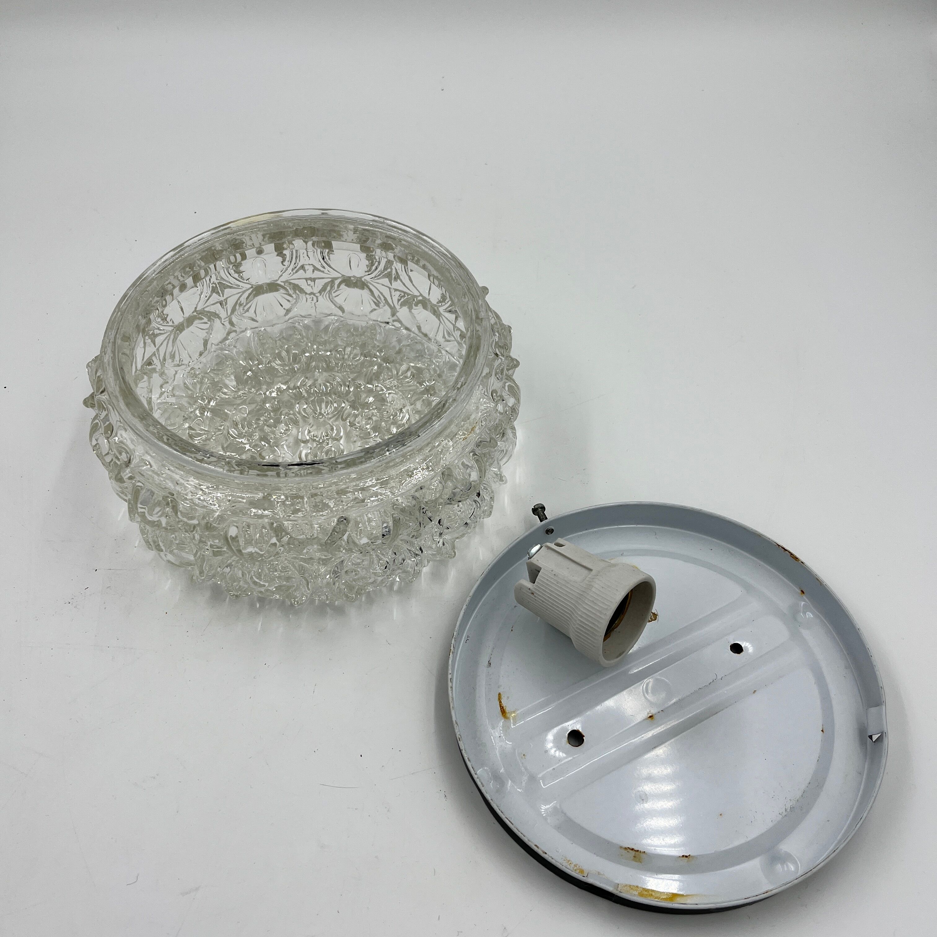 Cast glass ceiling lamp with relief