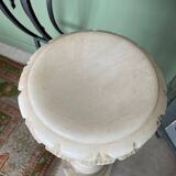 White marble column – sculpted base