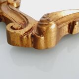 Miroir baroque doré à la feuille d'or