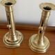 Pair of antique brass push candlesticks