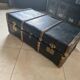 Old trunk in zinc/wood and brass