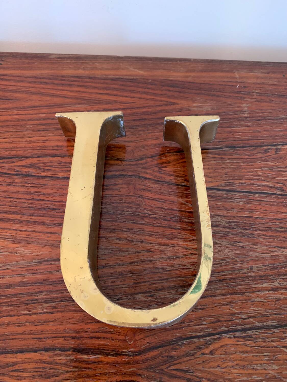 Golden sign letter “U”