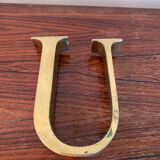 Golden sign letter “U”