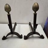 Old pair of wrought iron and bronze andirons