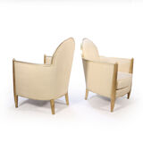 Pair of French Art Deco Armchairs in Parcel Gilt wood