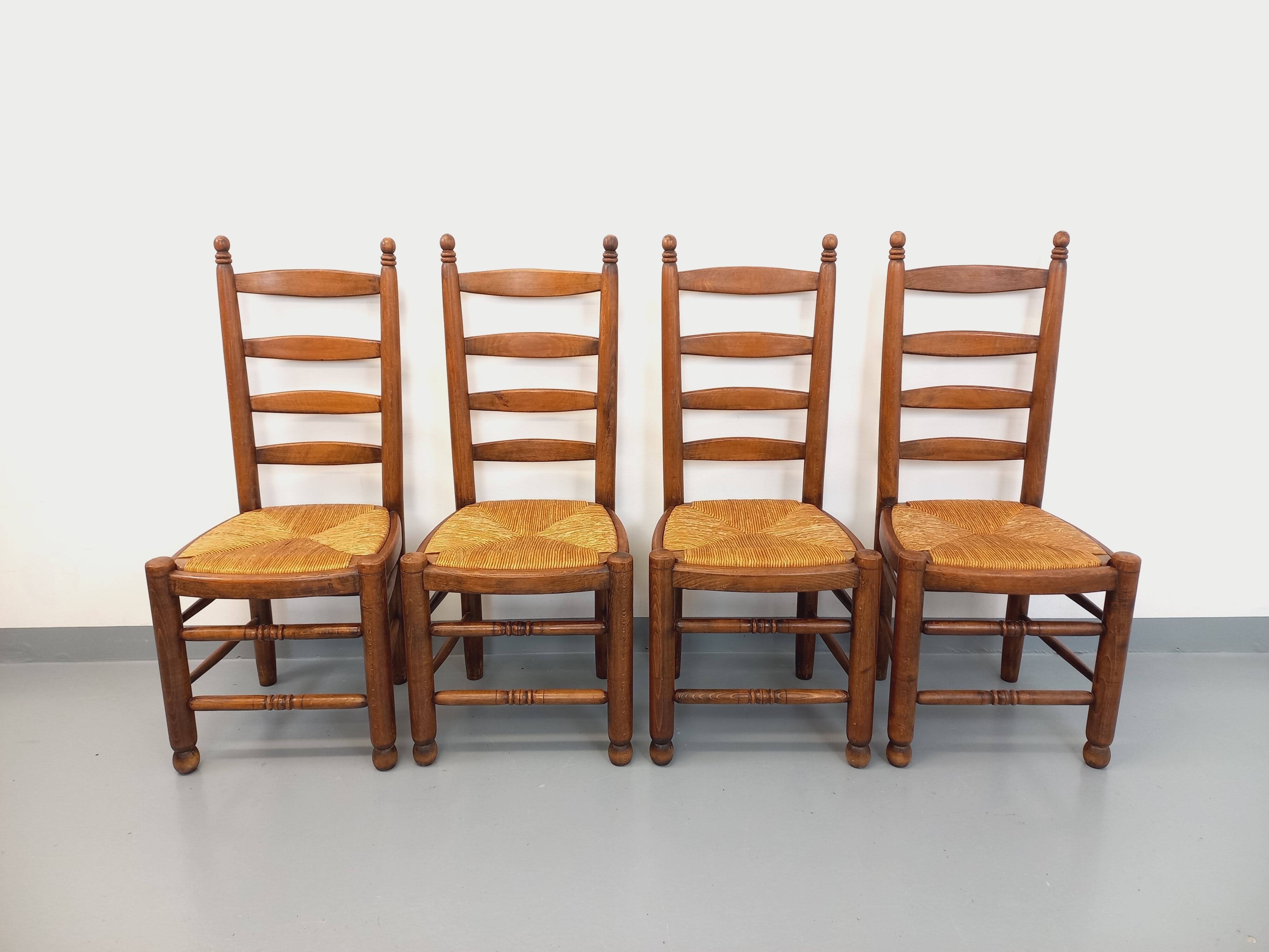 Set of 4 vintage brutalist Charles Dudouyt chairs in wood and straw from the 60s