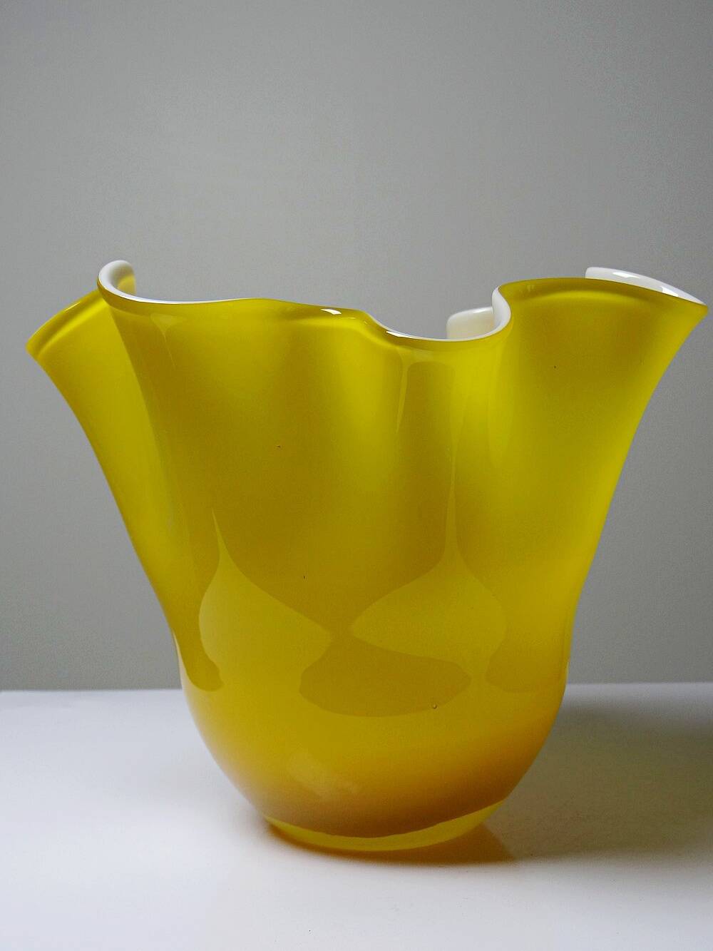 Fazzoletto vase in blown Italian glass, yellow opaline lined, Murano 1960-70.