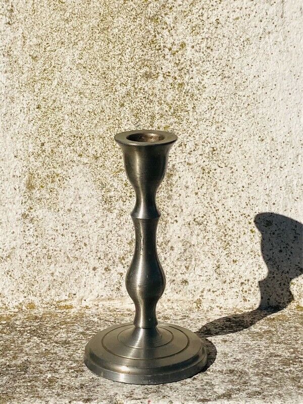 Old tin candle holder