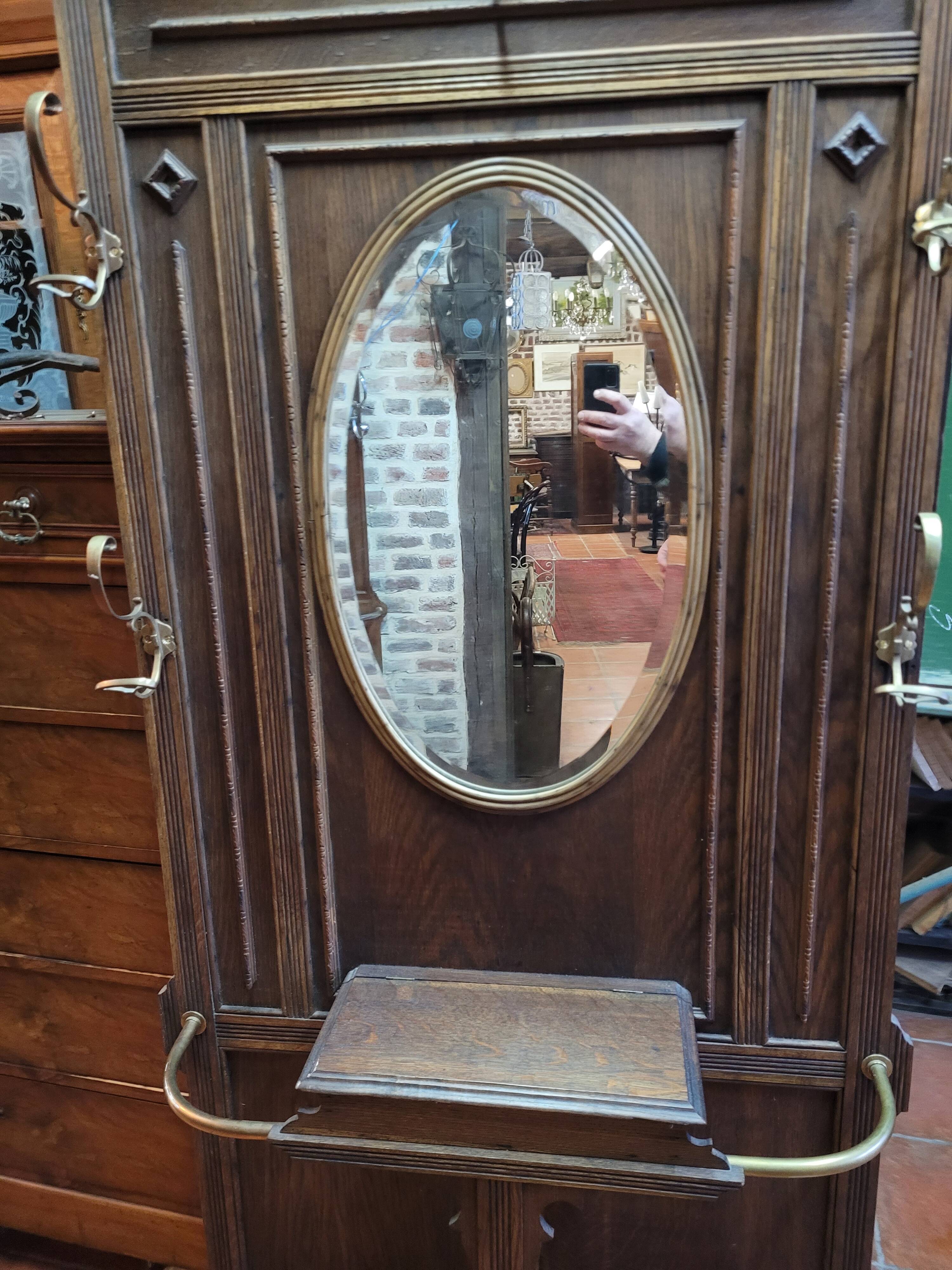 Old cloakroom or coat rack in oak