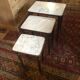 Pull-out tables in brass marble and wood