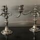 Pair of silver metal candlesticks