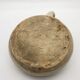 Old round sandstone hot water bottle
