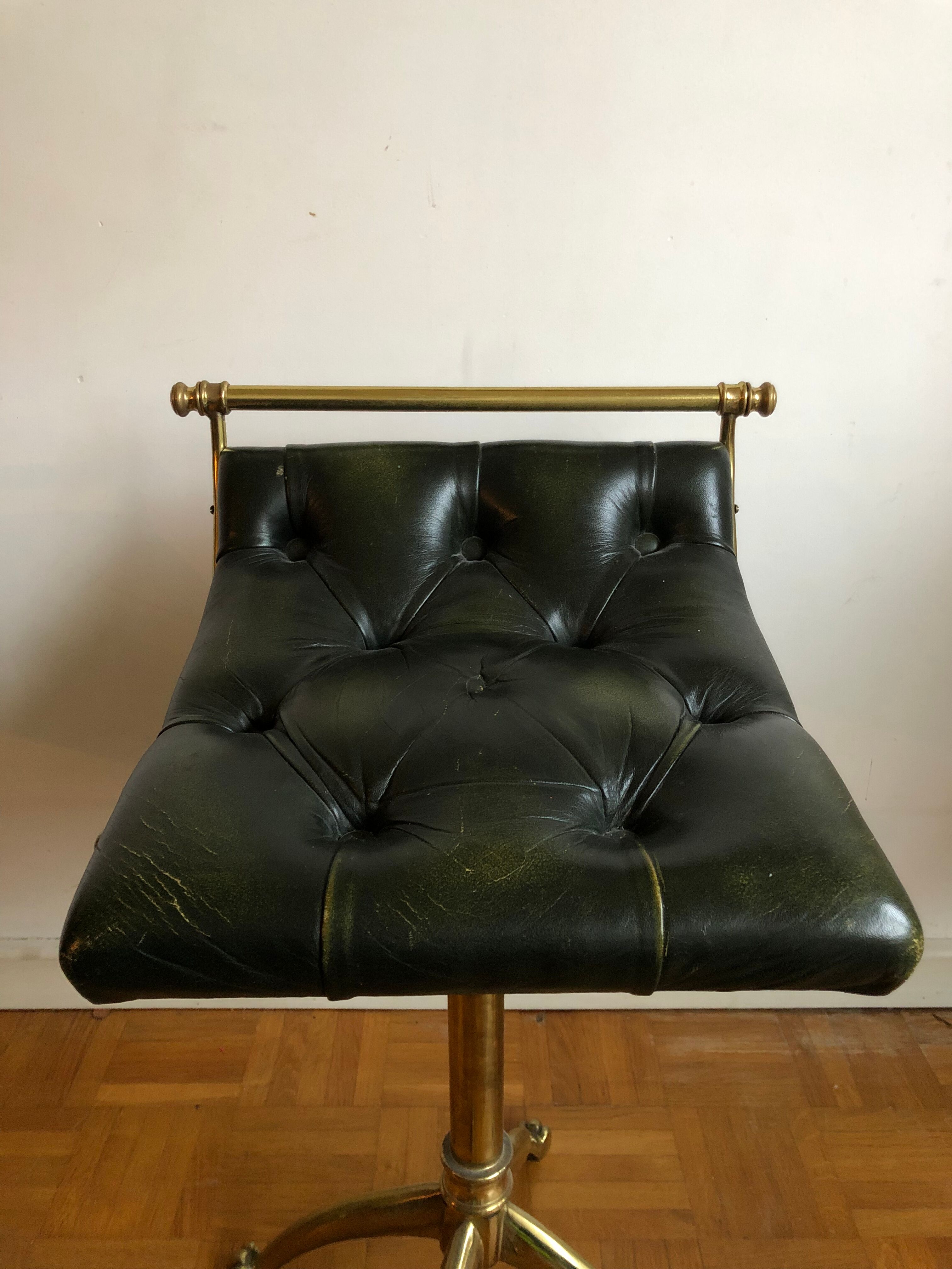 Pair of Chesterfield style brass and leather stools