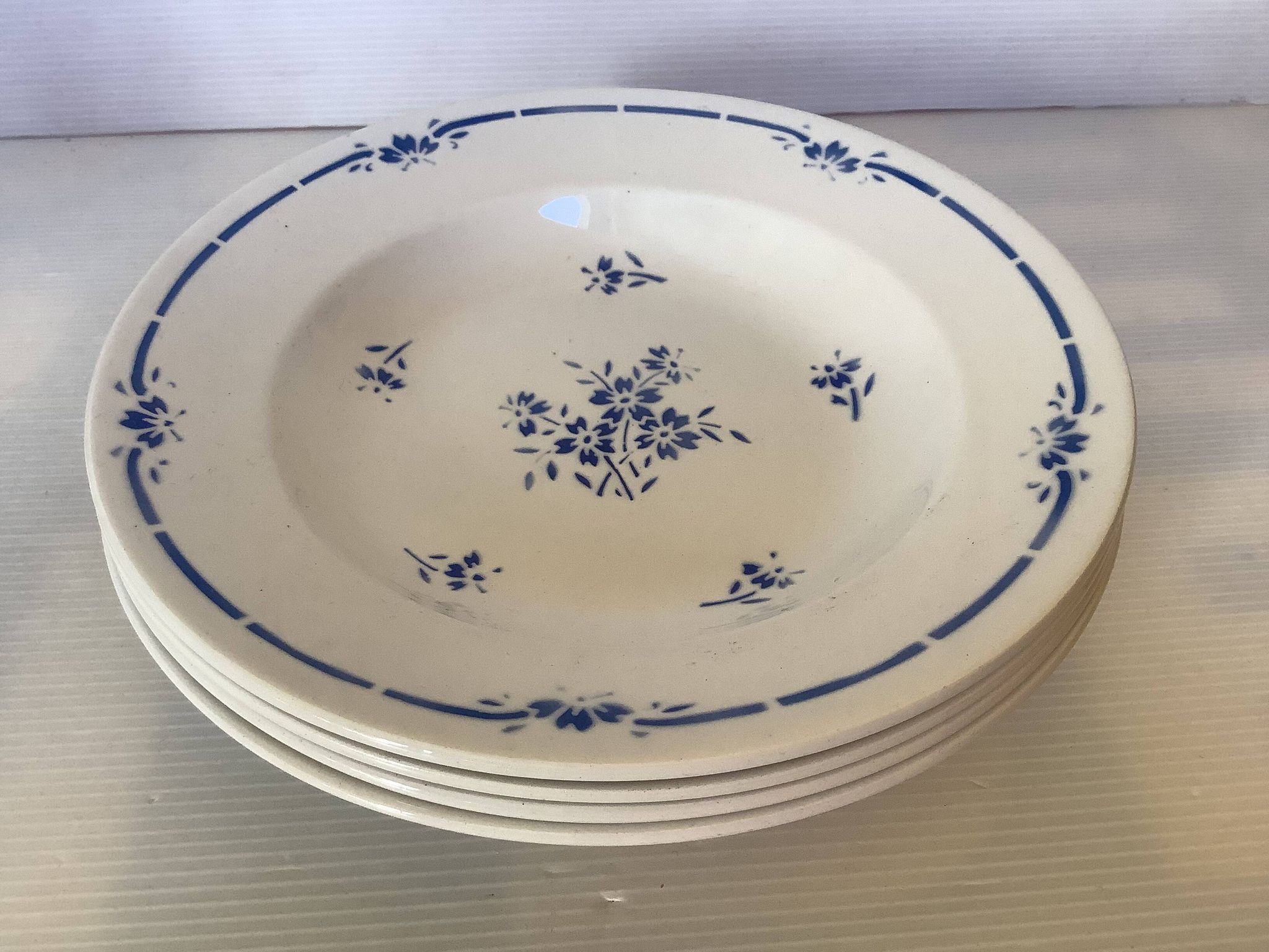 Four old Juan Moulin des Loups plates