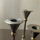 Trio of vintage metal and bronze candle holders