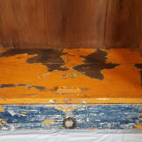 Old temple-showcase with teak offerings