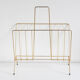 Vintage magazine holder in gold metal