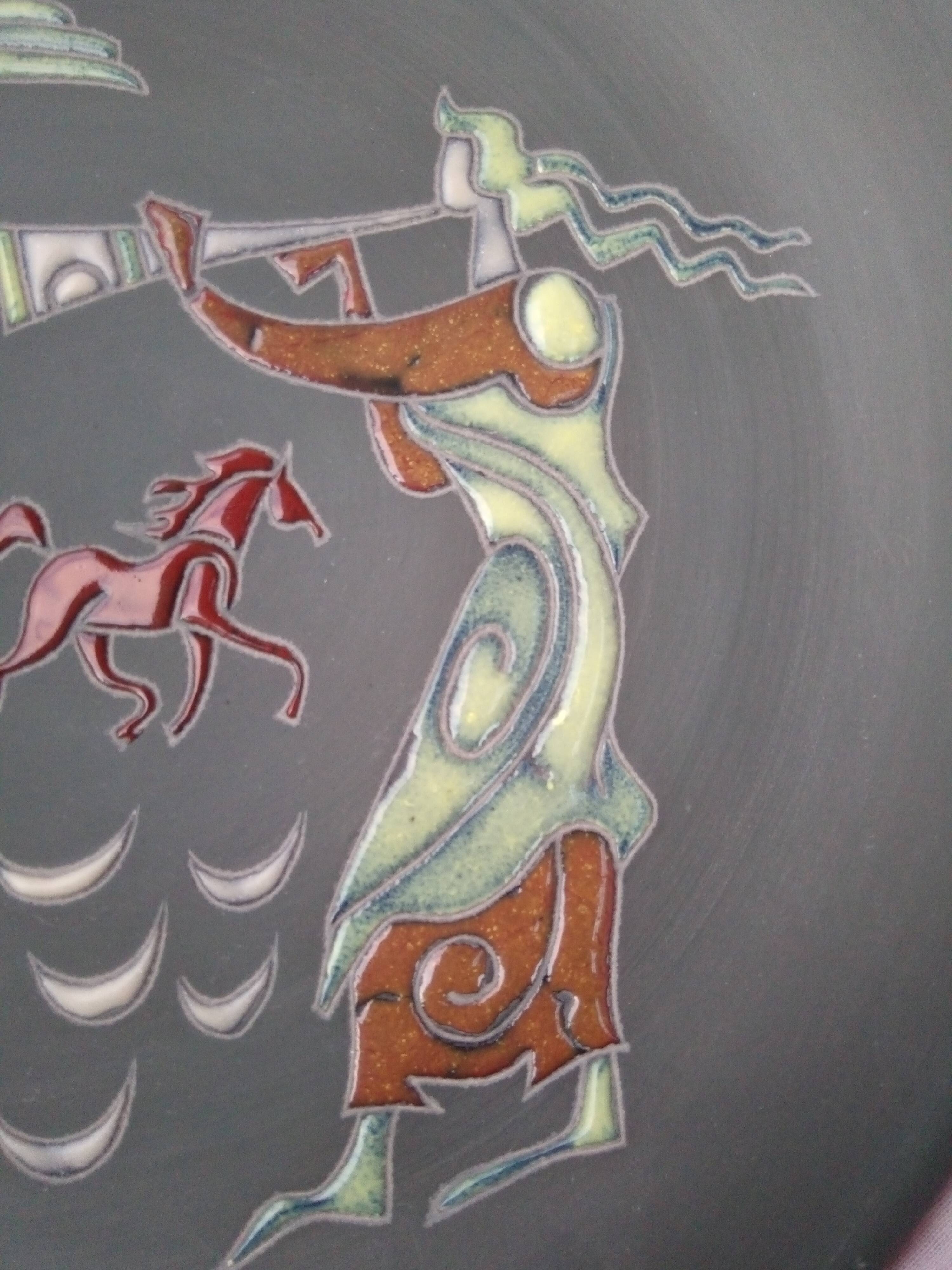 Rare pair of ceramic plates and enamel with mythological decoration. The 50s.