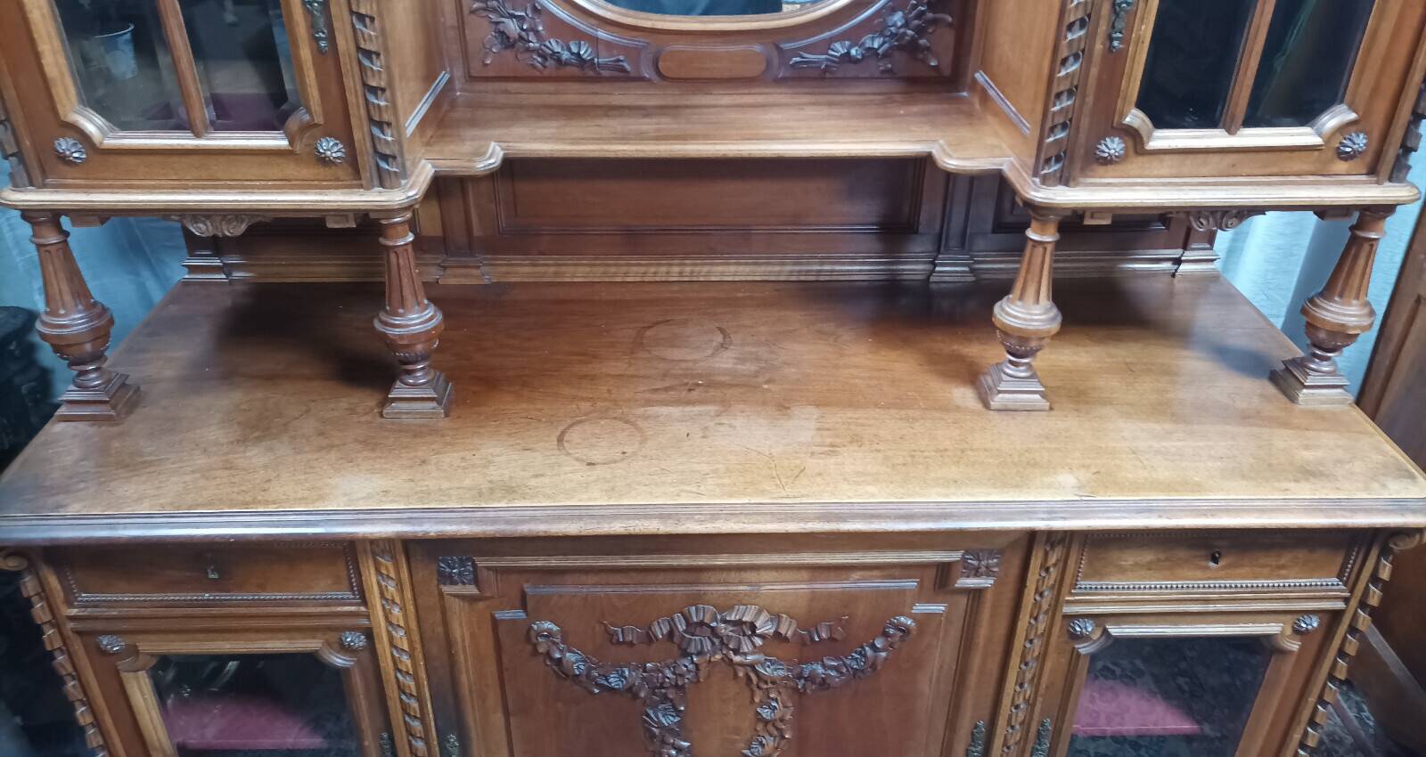 Louis XVI two-body buffet in carved walnut, 19th century.