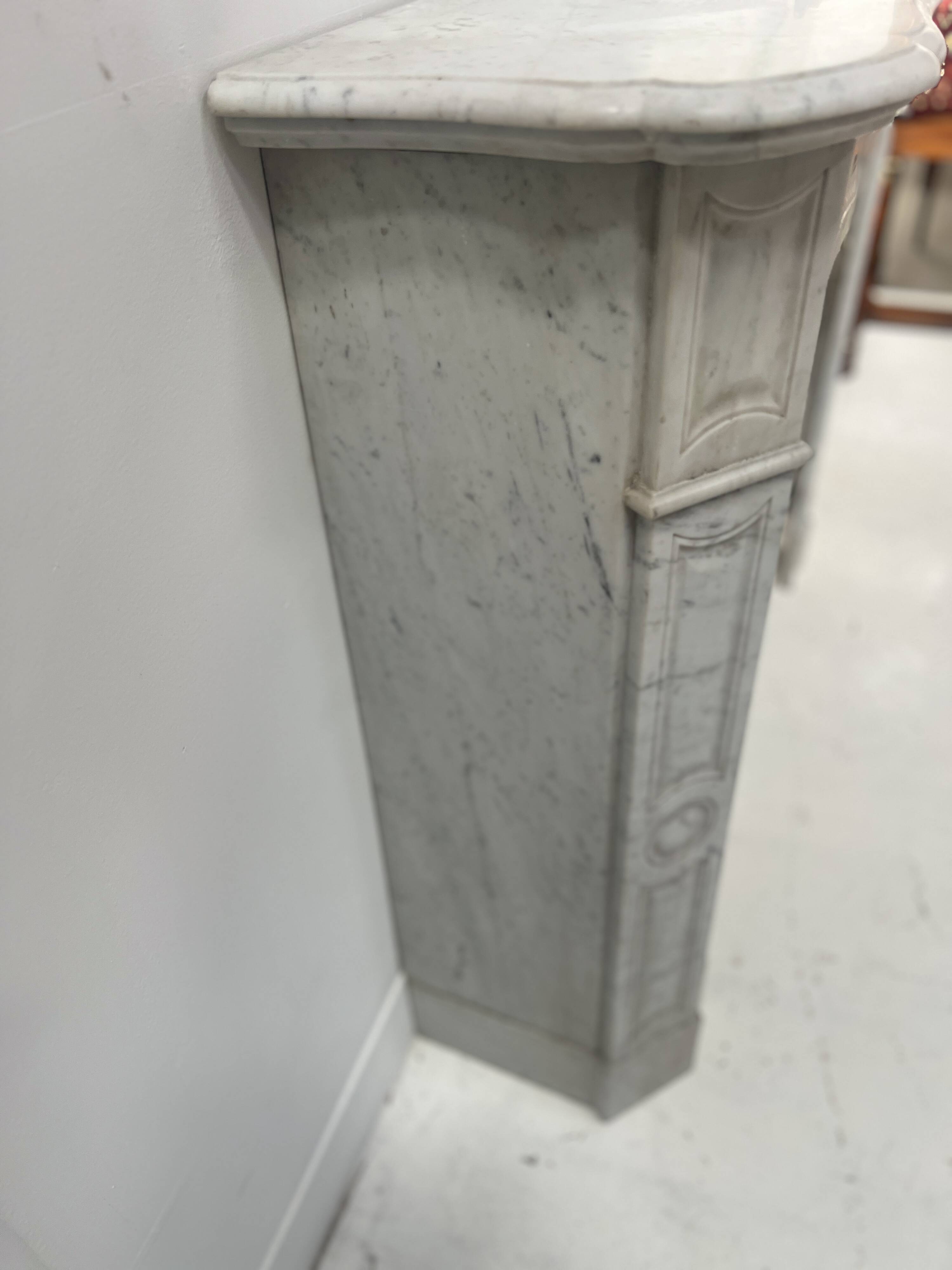 Louis XV style fireplace Model Pompadour White Carrara marble 20th century