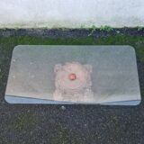 Coffee table with carved wooden base from India, glass top