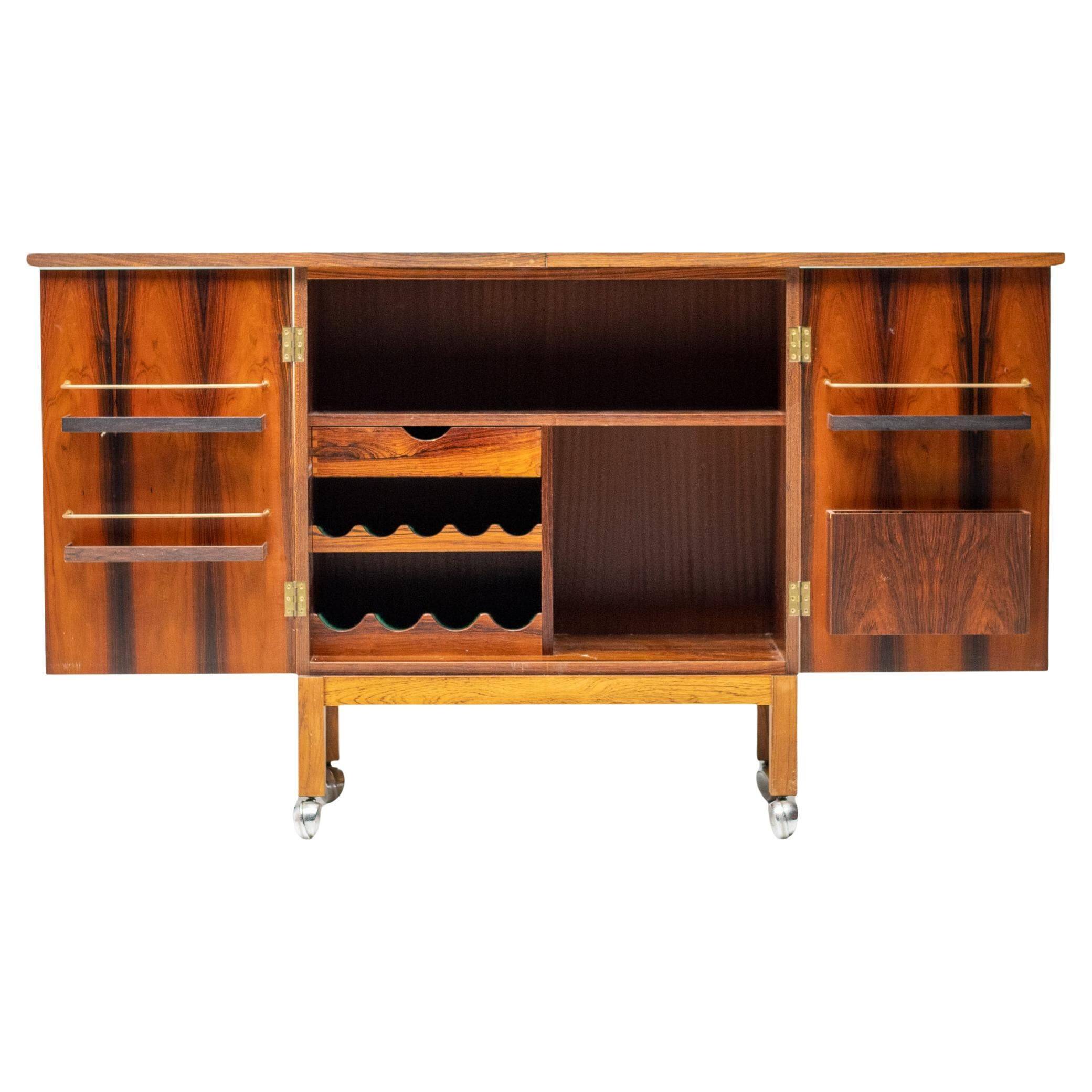 Meuble bar extensible "Times" de Torbjørn Afdal en bois de rose