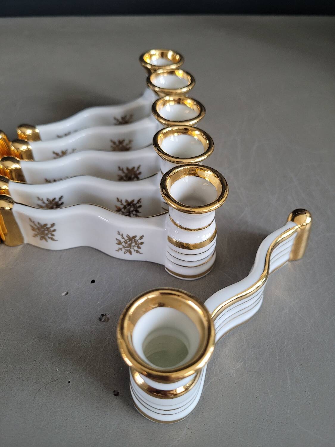 12 Limoges art porcelain knife rests in their case