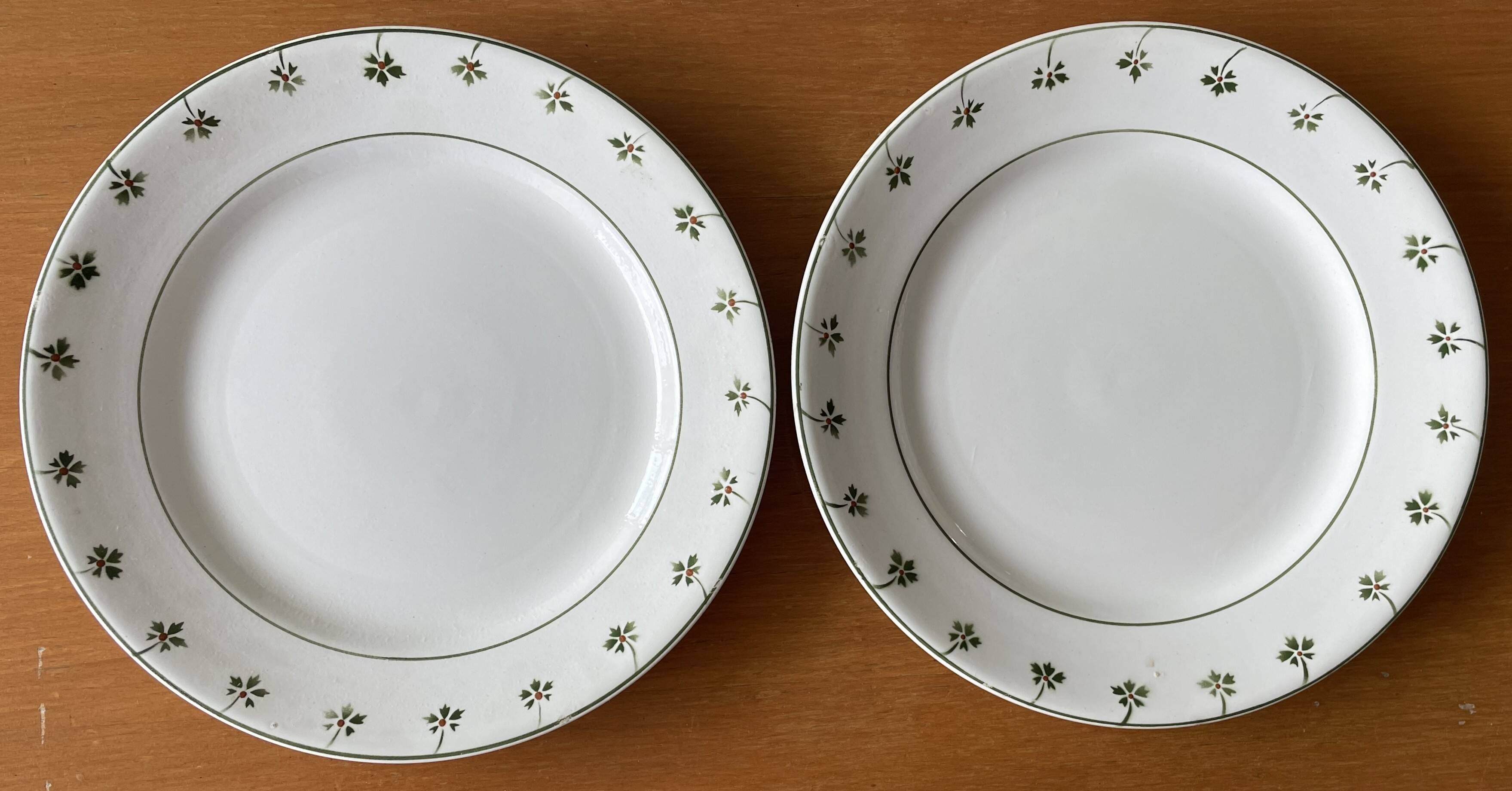 8 antique flat plates in Nimy earthenware