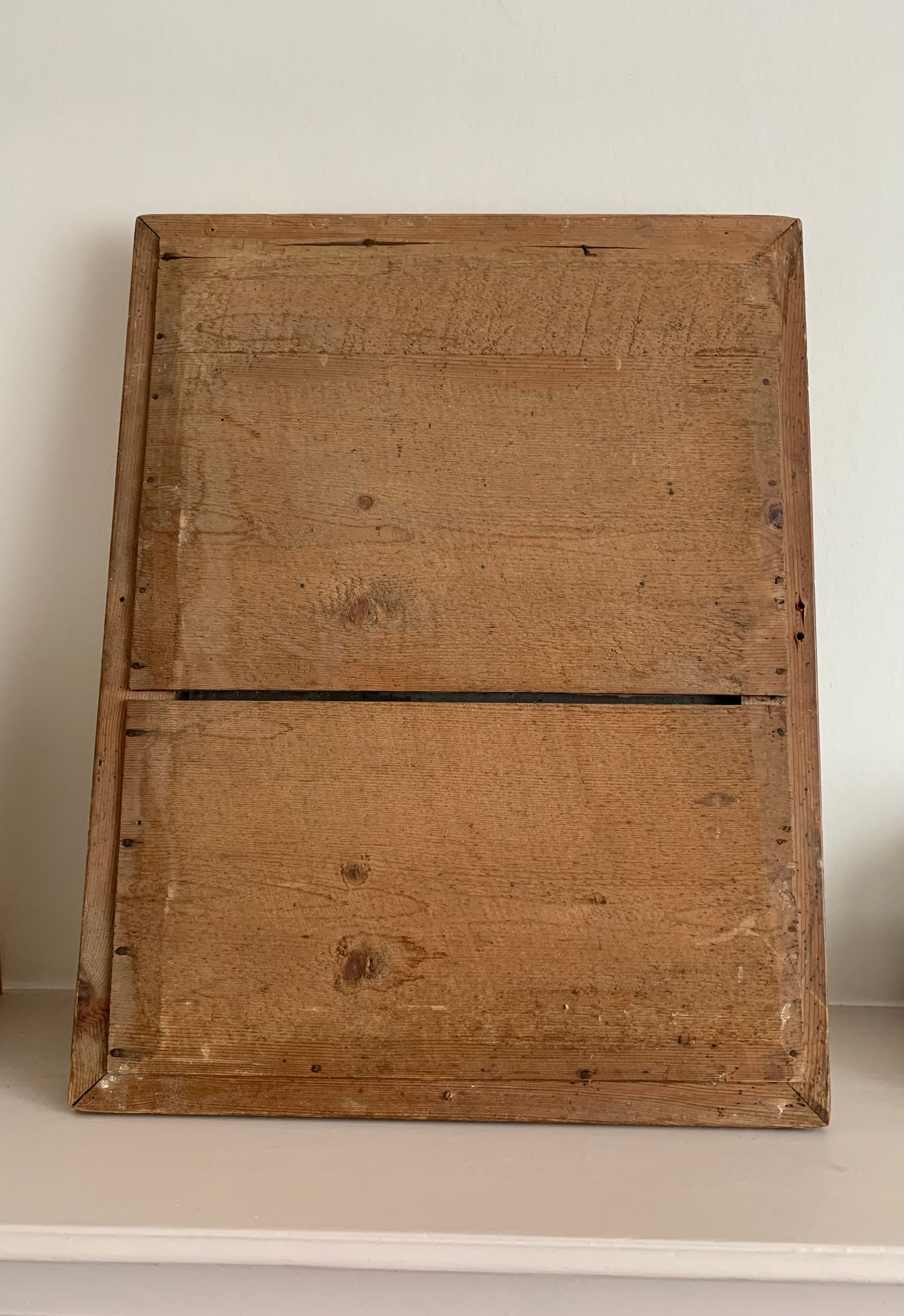 Carved and gilded wooden mirror  44x56cm