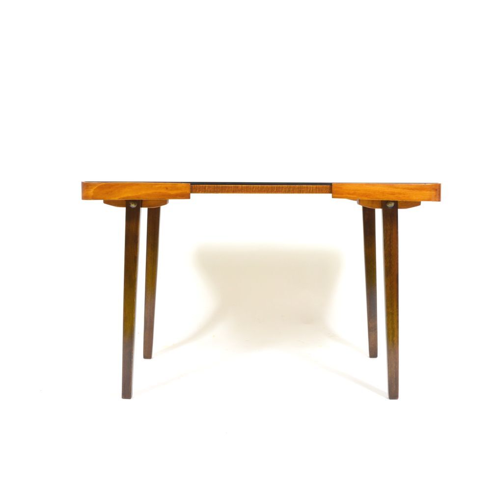 With 70 years black glass coffee table