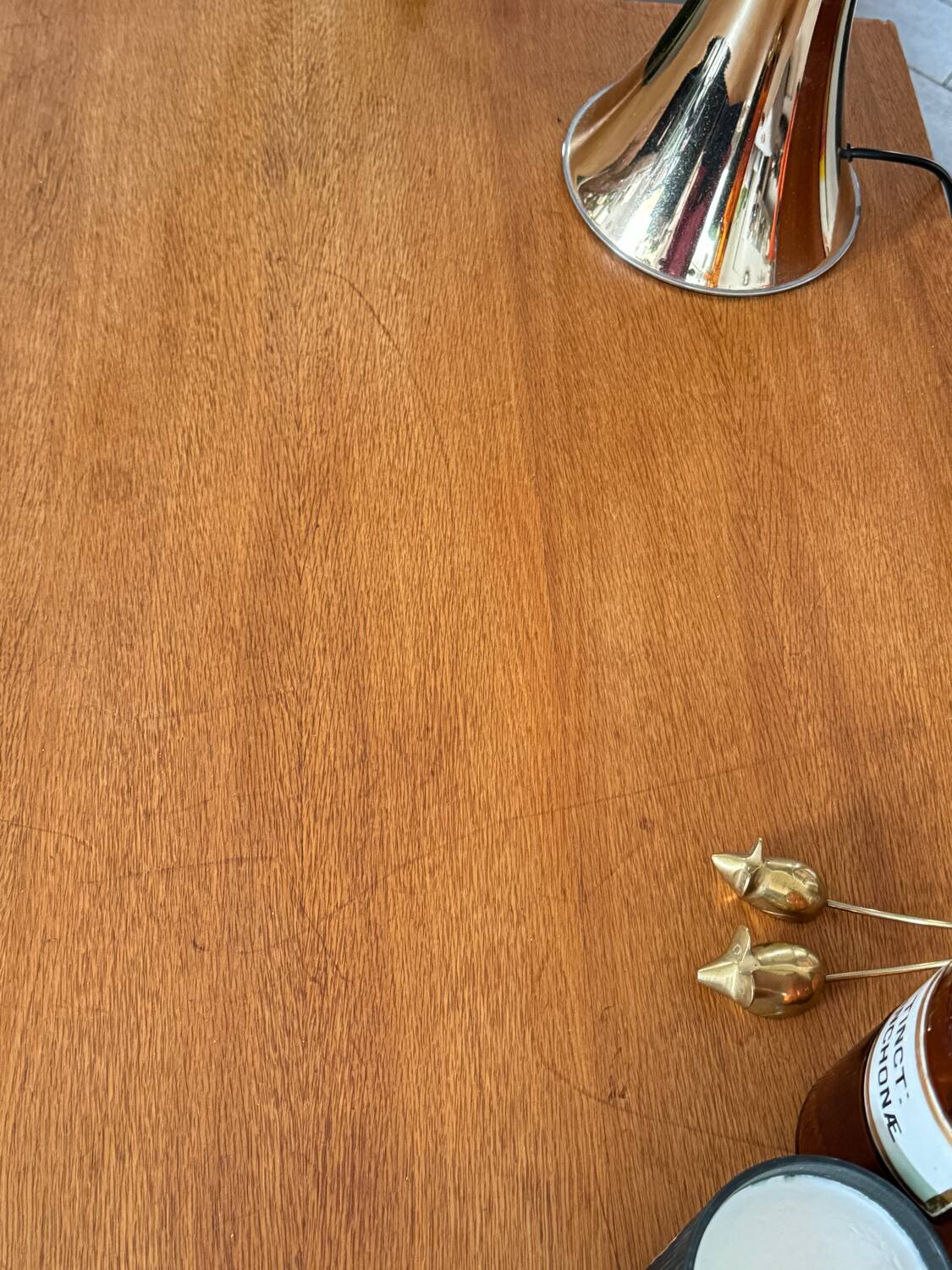 Old wooden desk or side table with compass legs
