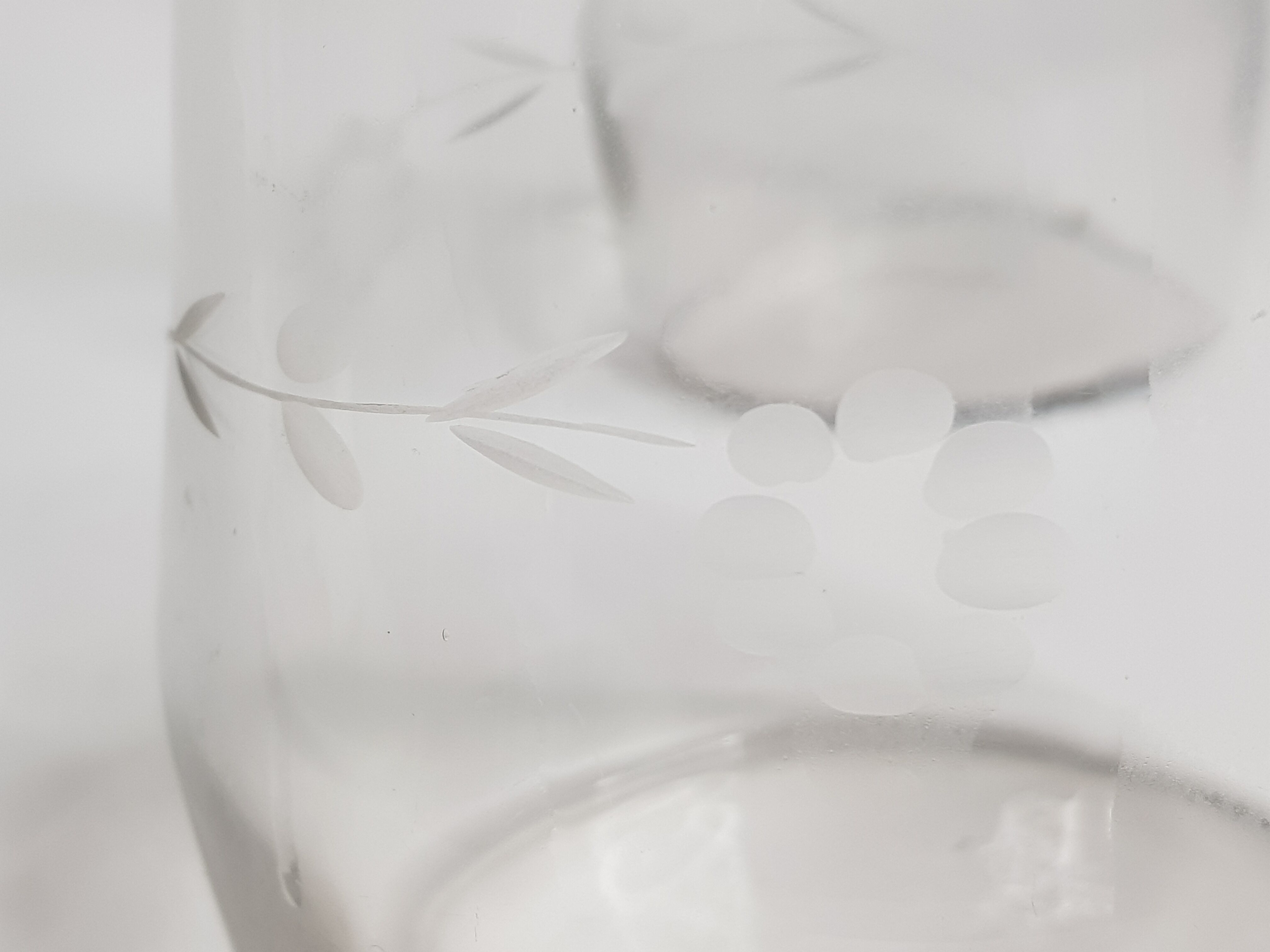 Pair of blown glass decanters and cut with flowers