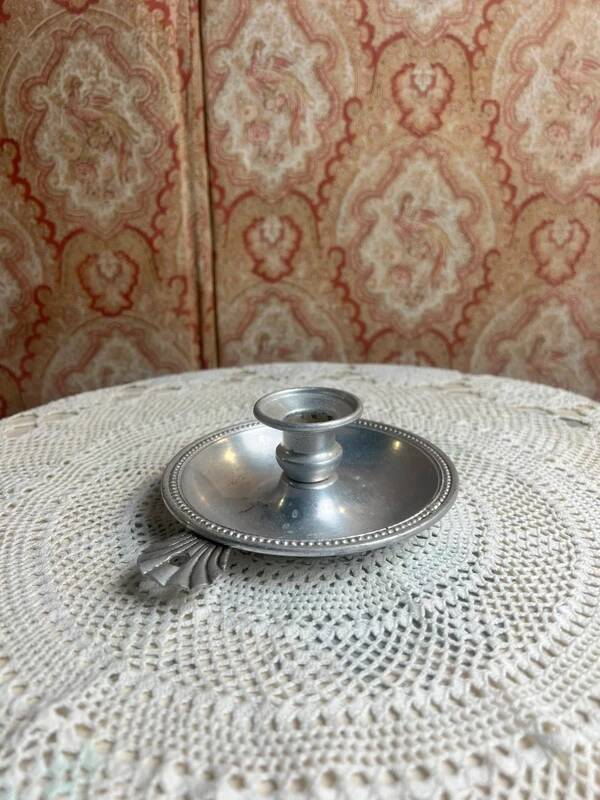 Silver aluminum hand candle holder