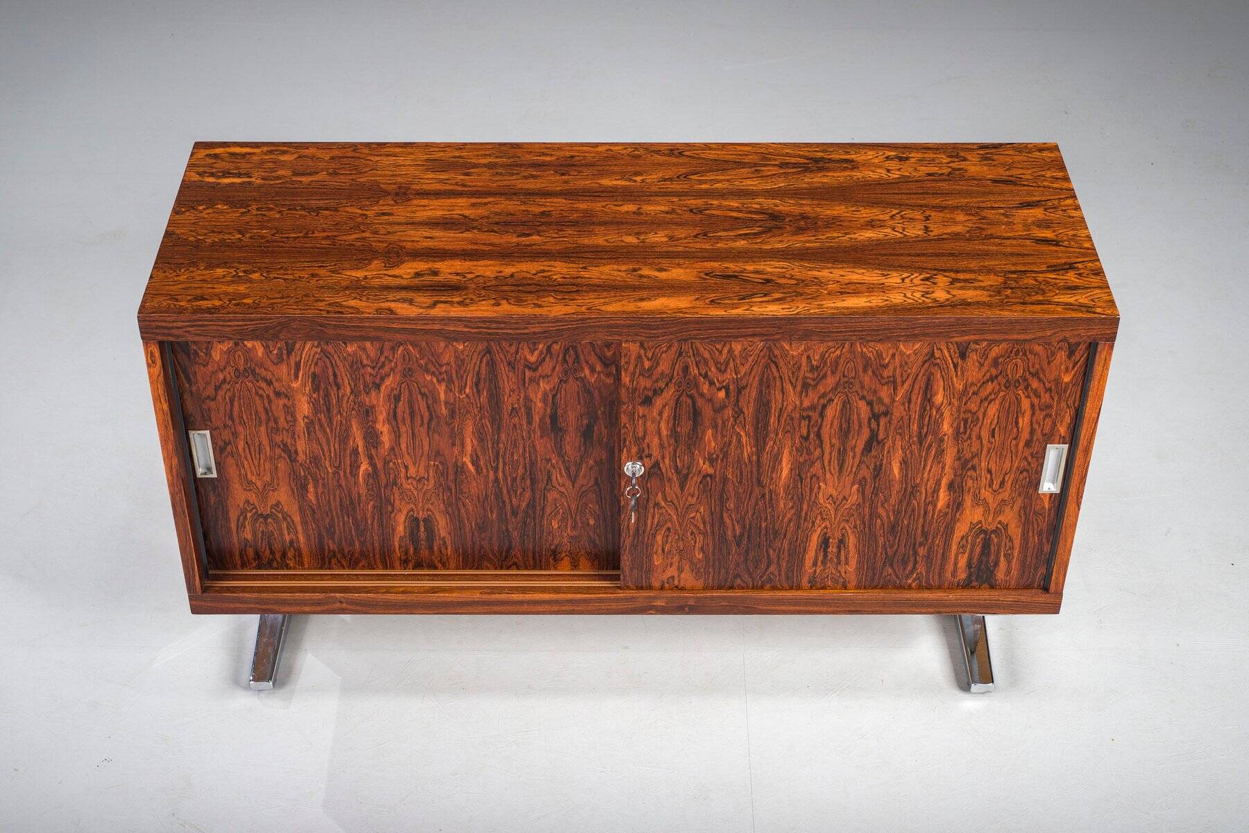 Mid-century wood veneer sideboard with chrome legs, 1960s