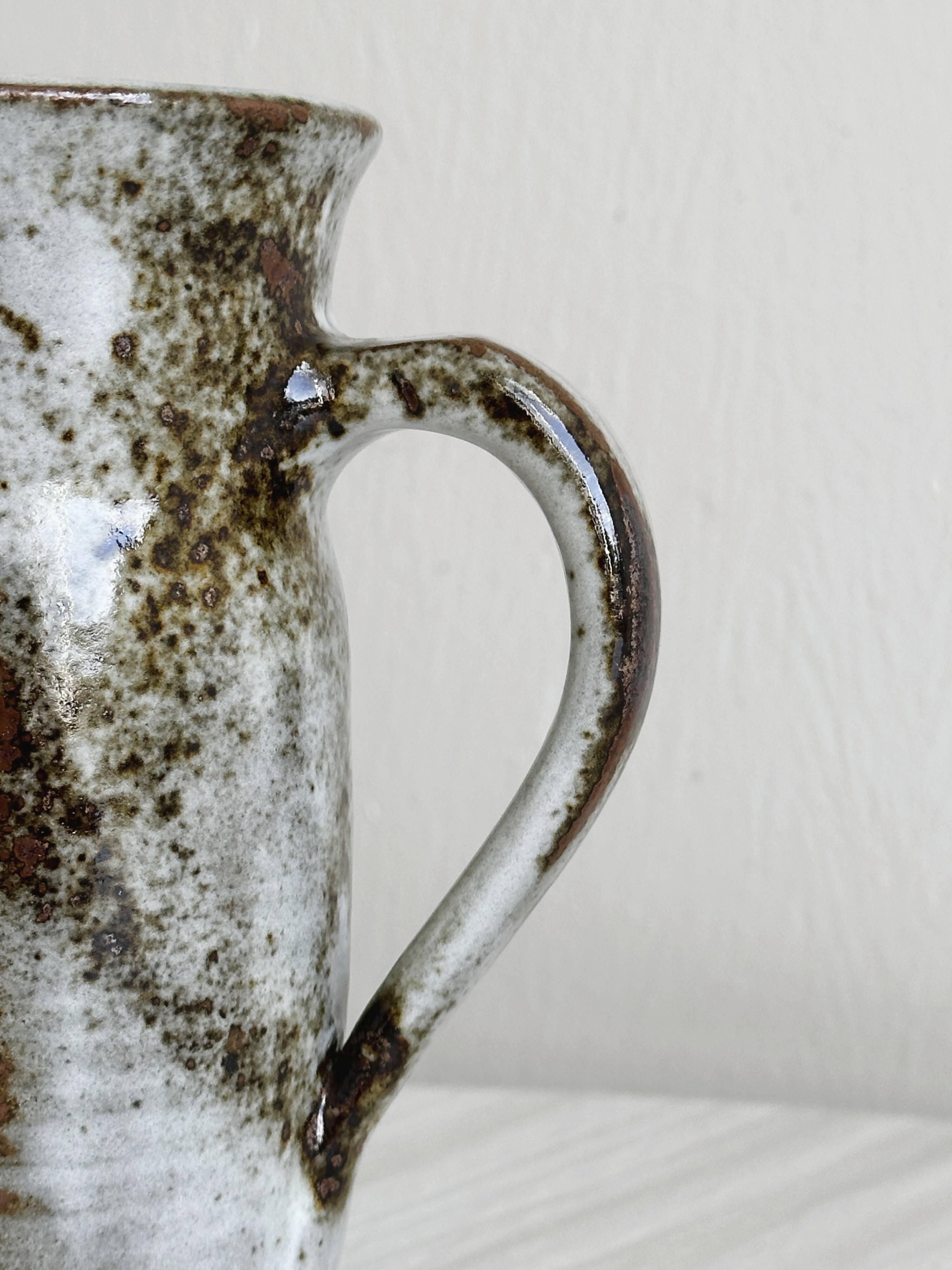 Small sanded stoneware pitcher signed Chantal and Thierry Robert