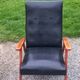 Pair of vintage beech armchairs feet compass covered with black moleskine from the 50s