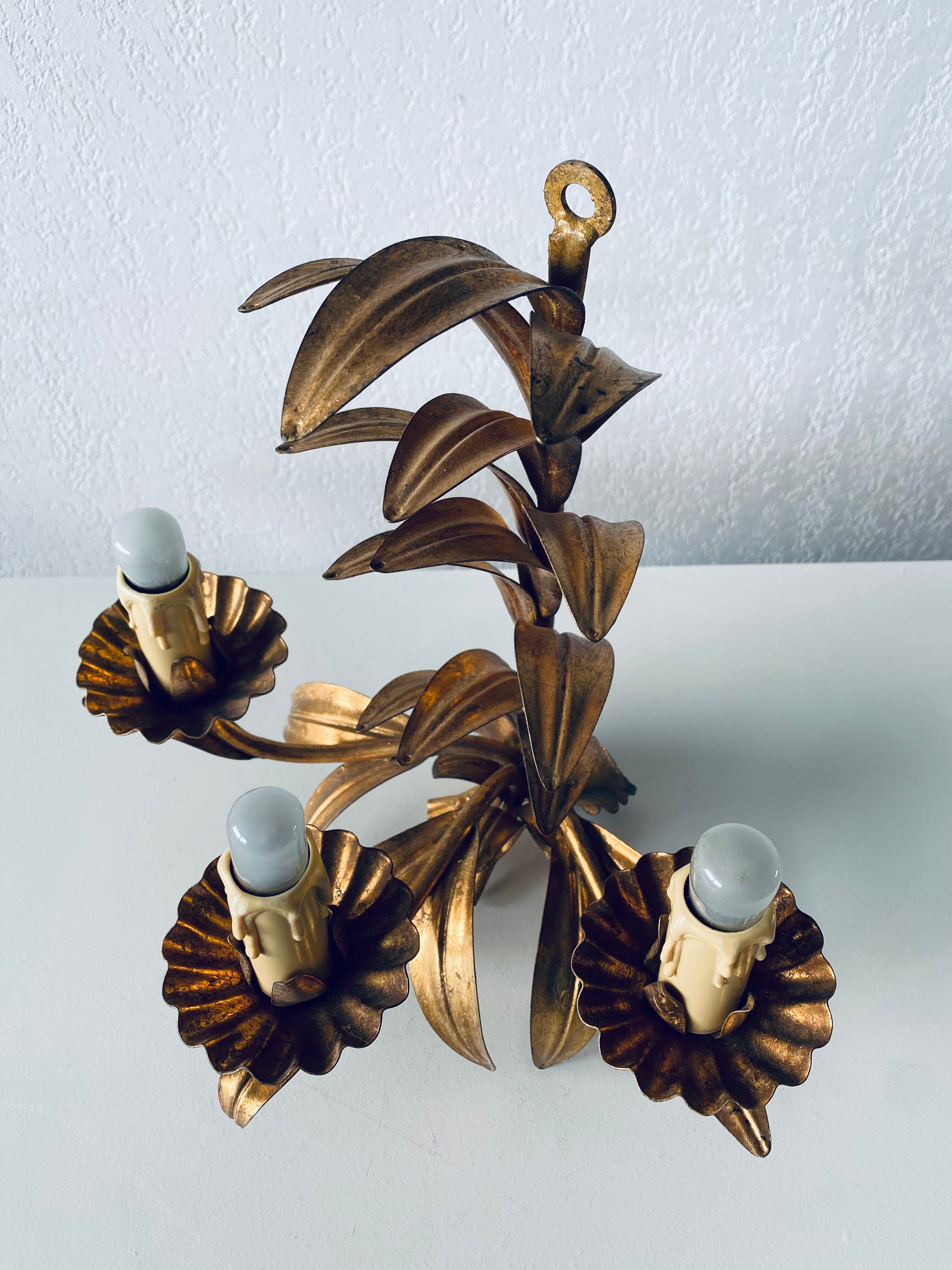 Golden leaf wall light