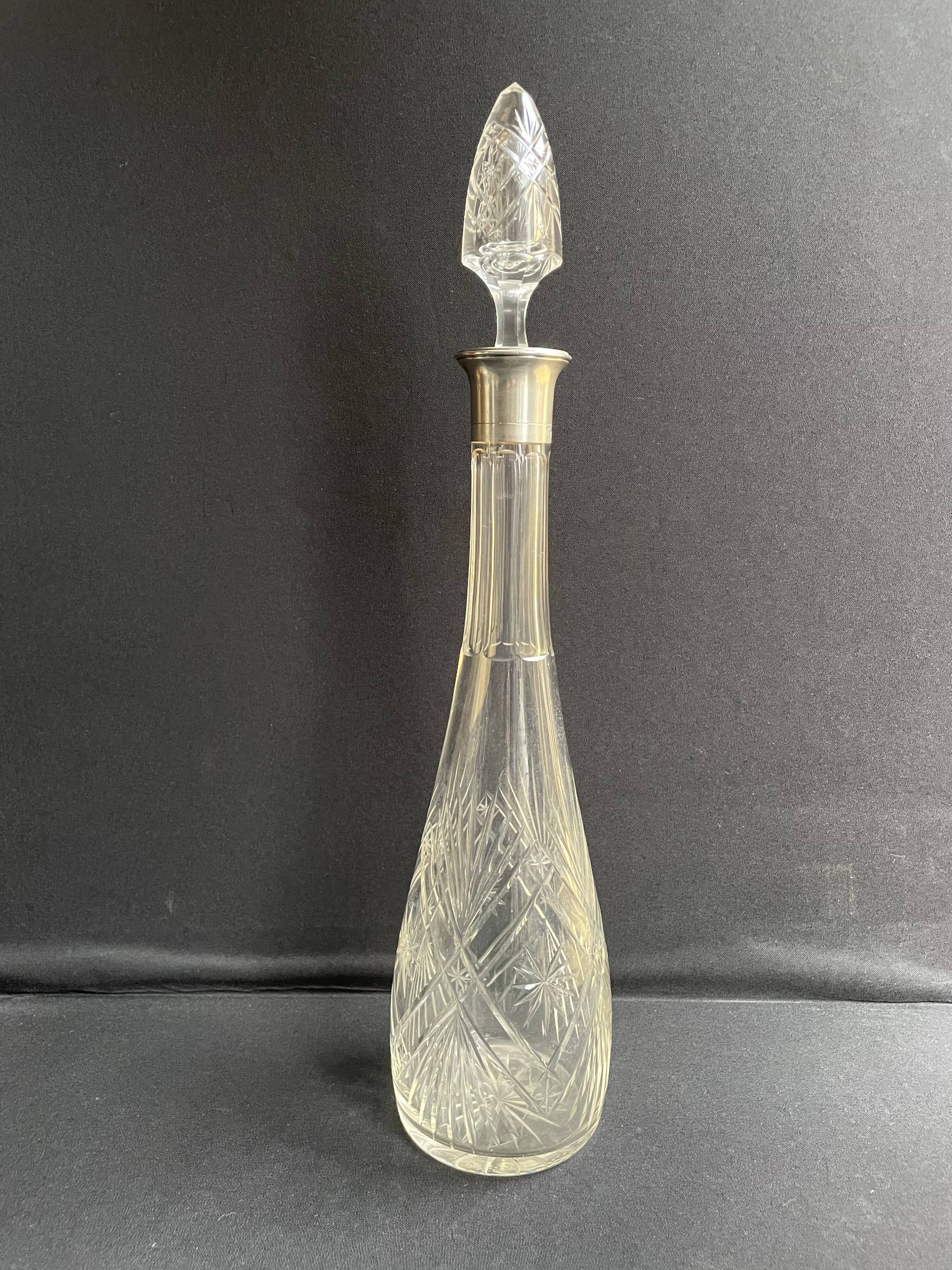 Blown crystal decanter, cut and silver collar