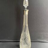 Carafe en cristal soufflé, taillé et col en argent