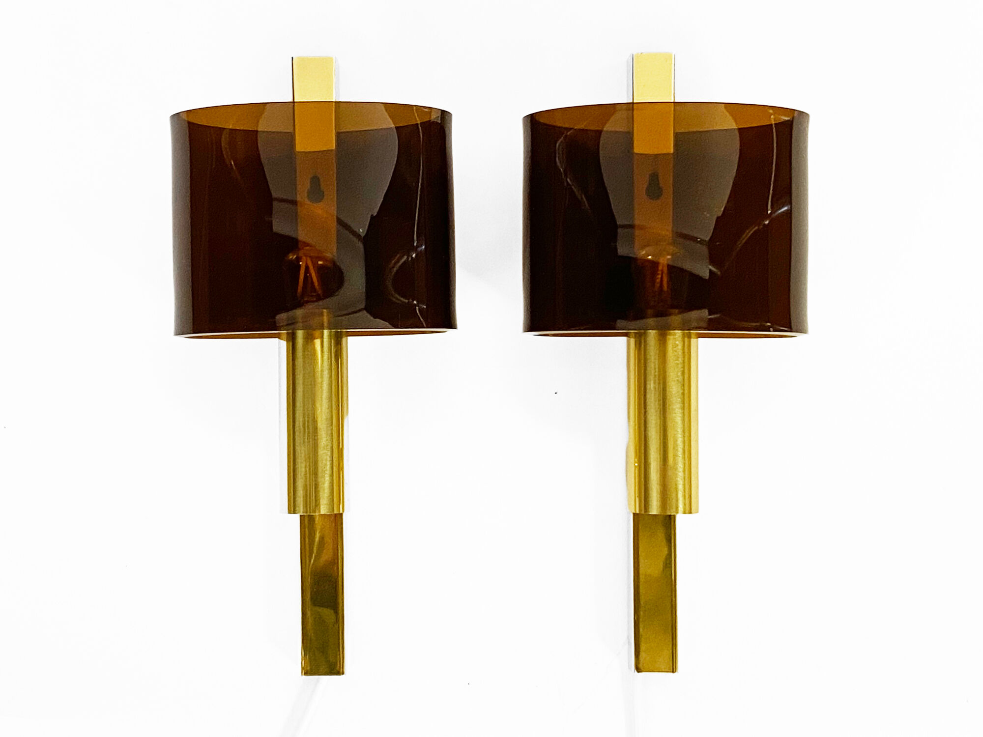 Pair of brass sconces with toned plastic shades, Denmark 1970s