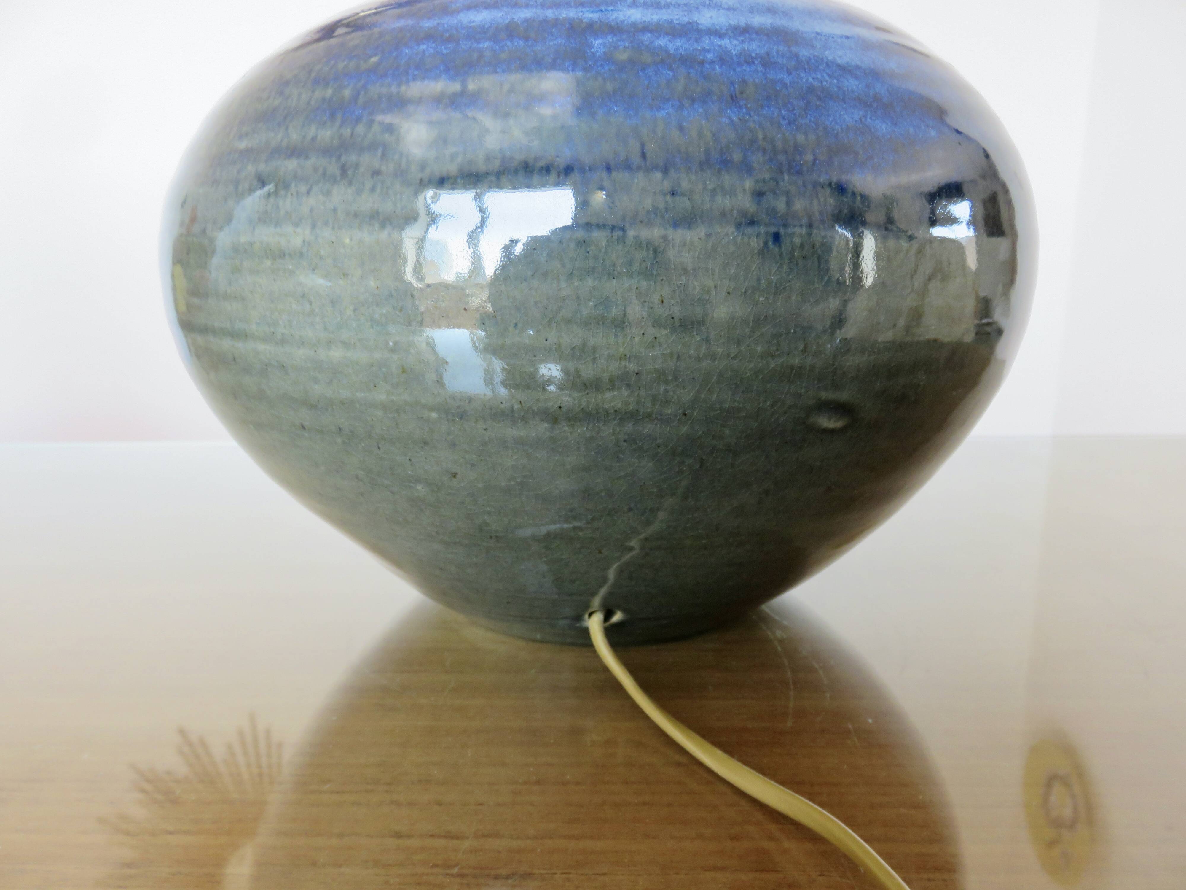 Impressive iridescent blue ceramic lamp with a gradient of green, circa 1960.