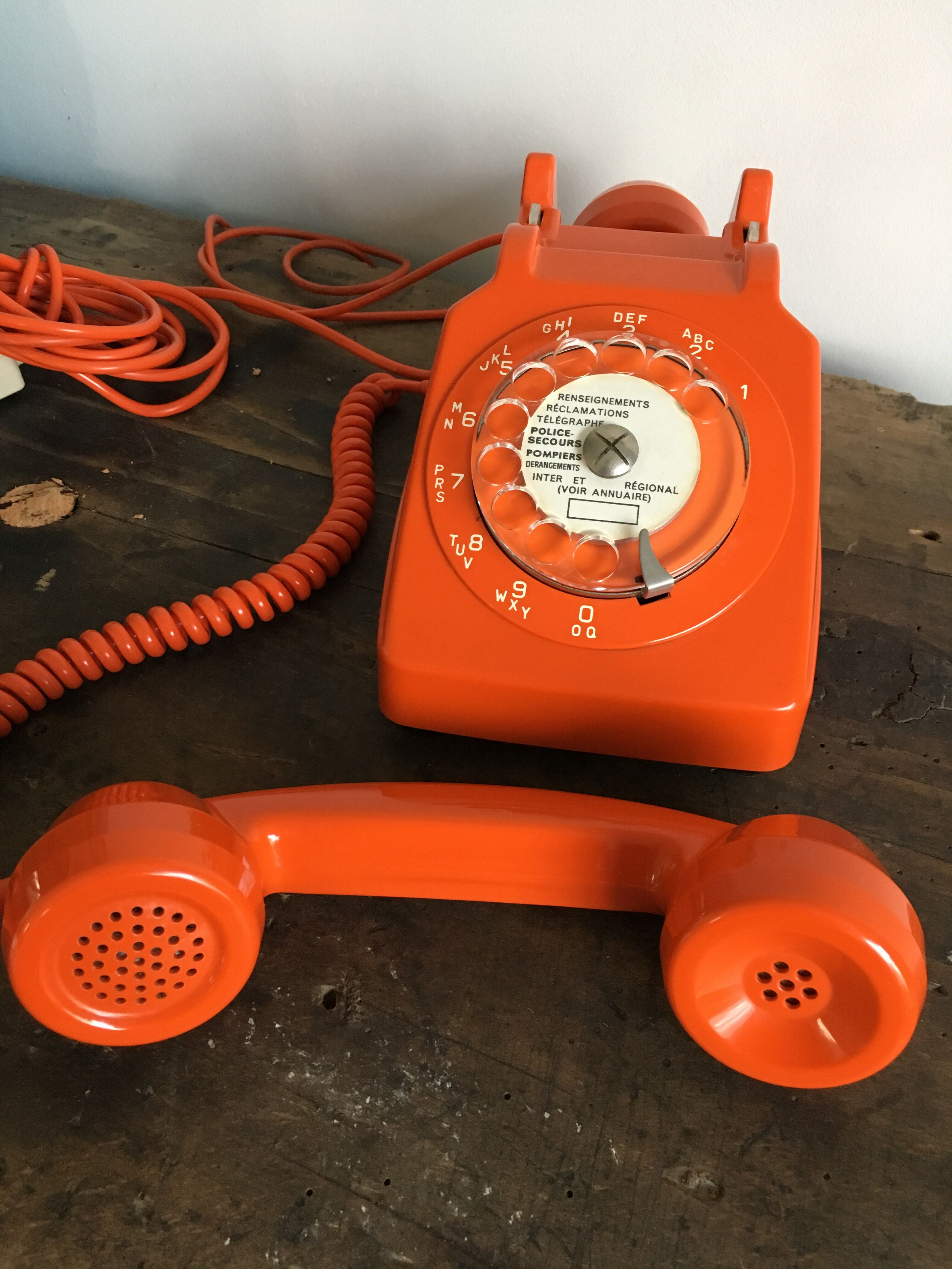 S63 orange vintage rotary phone